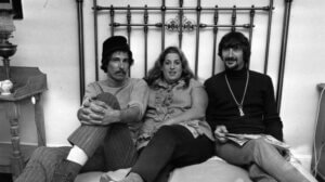 Mama Cass Elliot with her Mamas and the Papas bandmates John Phillips and Denny Doherty in 1966.</p