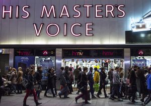 LONDON, UNITED KINGDOM - NOVEMBER 29: Oxford Street crowds outside high street record shop HMV on November 29, 2013 in London, United Kingdom. Though traditionally a US phenomenon, "Black friday" sales appear to have taken hold in the UK with many retailers offering large discounts for one day only, mimicking the behaviour of their American counterparts. (Photo by Dan Dennison/Getty Images)